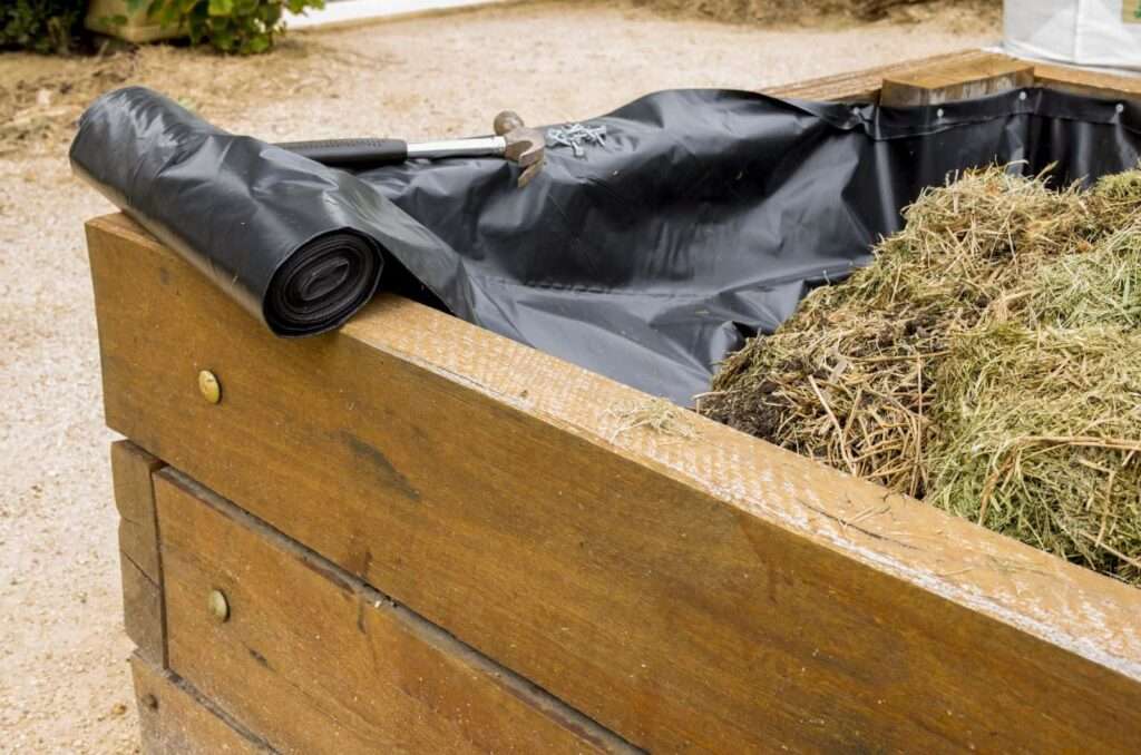 Pros and Cons of Lining a Raised Garden Bed with Plastic Pros and Cons of Lining a Raised Garden Bed with Plastic