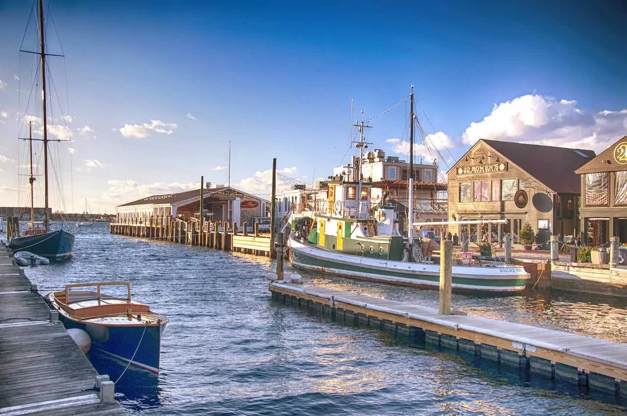 Living off the grid in Rhode Island is difficult due to building code requirements for water, electricity, heating, and water heater.